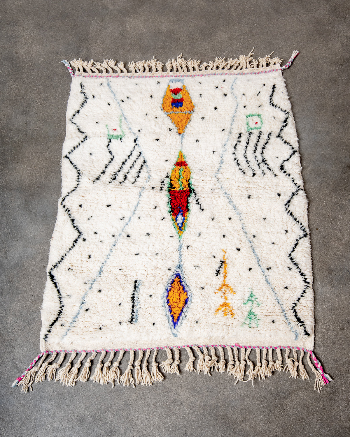 Modern, designer, handcrafted Berber rug from Morocco. Beniourain carpet with beautiful colours and patterns and fluffy wool texture.